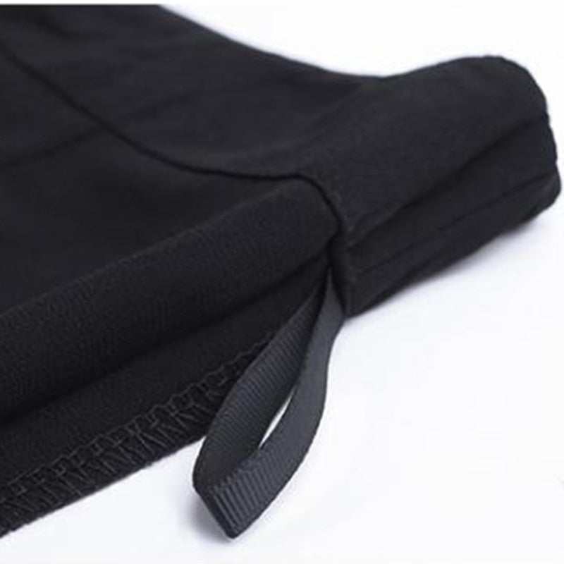 ORLEANS Pantalón negro con abertura elegante